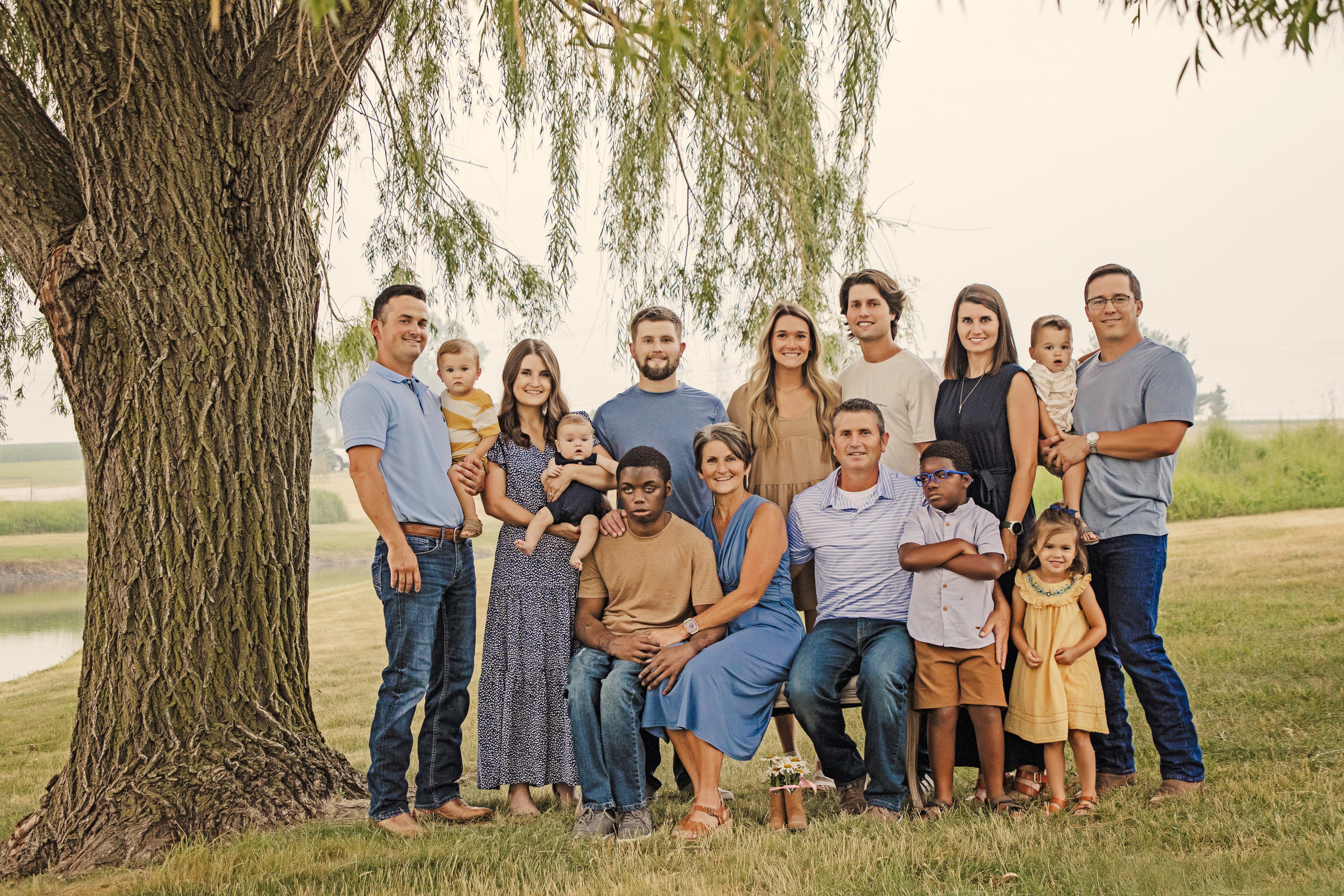The complete Holmes family - Jim, Karol, and all seven children together