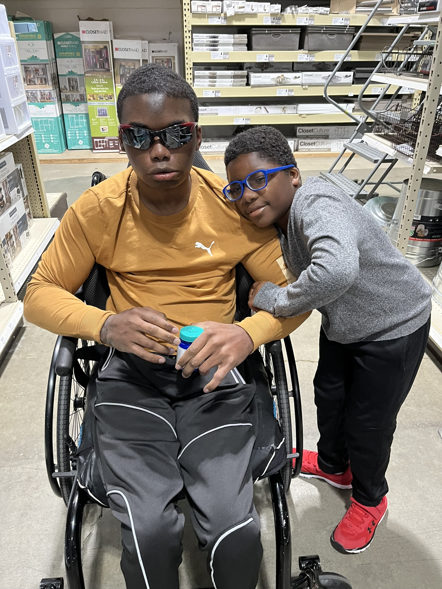 Moise and Kruz during a store visit