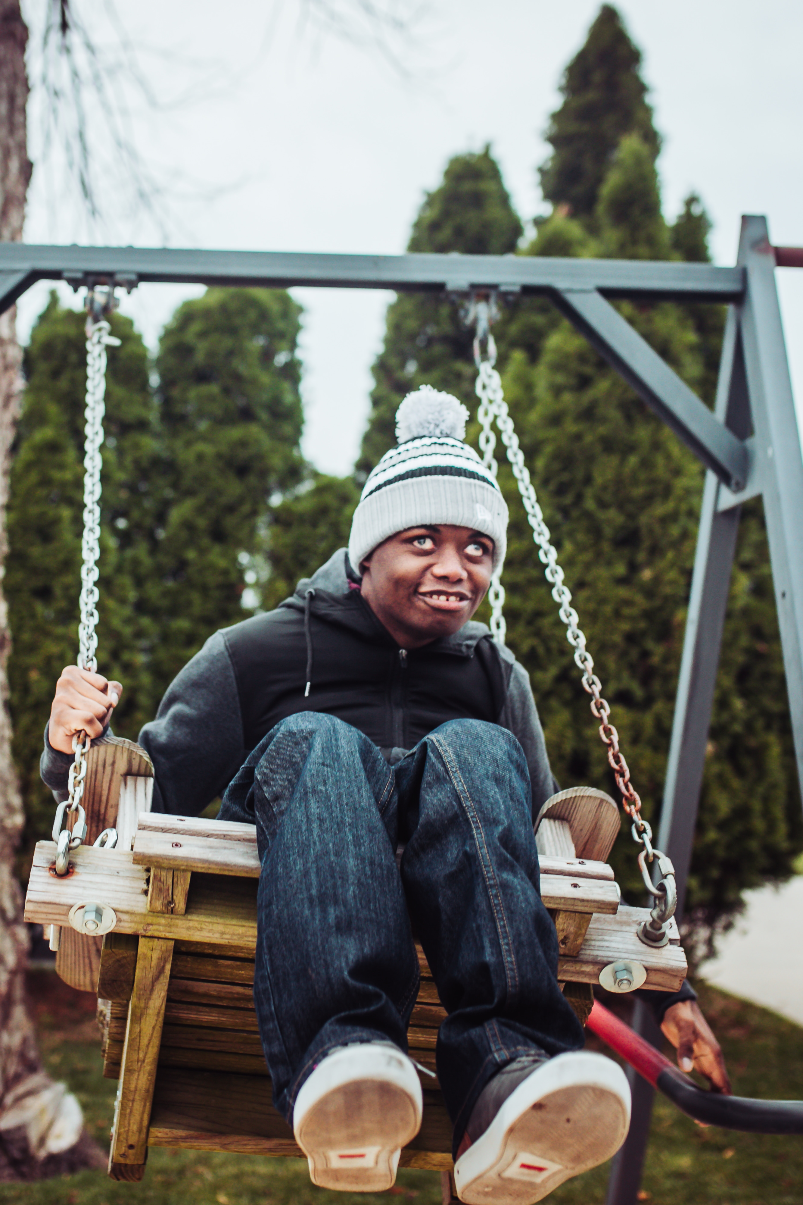 Moise enjoying time on a swing
